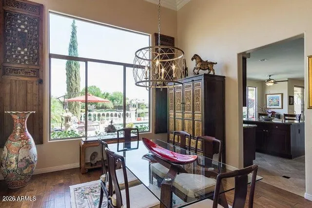 a view of a dining room with furniture window and outside view