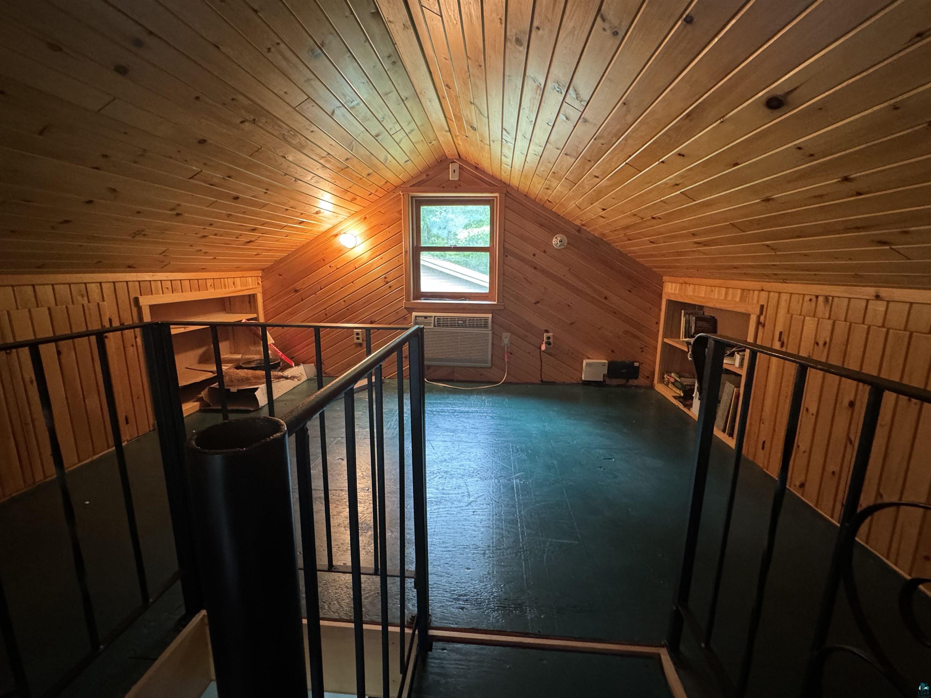 10690 Cedar Crest Road Iron River, WI 54847 - Photo 14 of 24 Bonus room with vaulted ceiling, wood walls, and wood ceiling