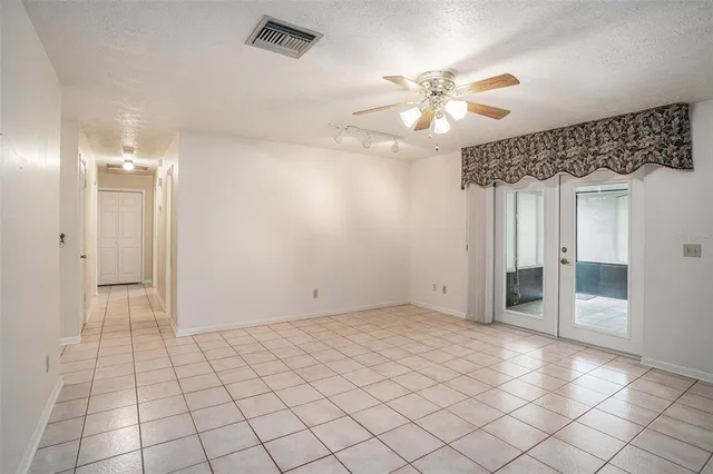wooden floor in an empty room and a window