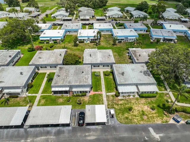 an aerial view of a house with a garden