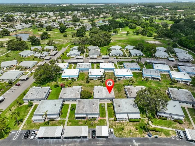 a view of a lake with a big yard