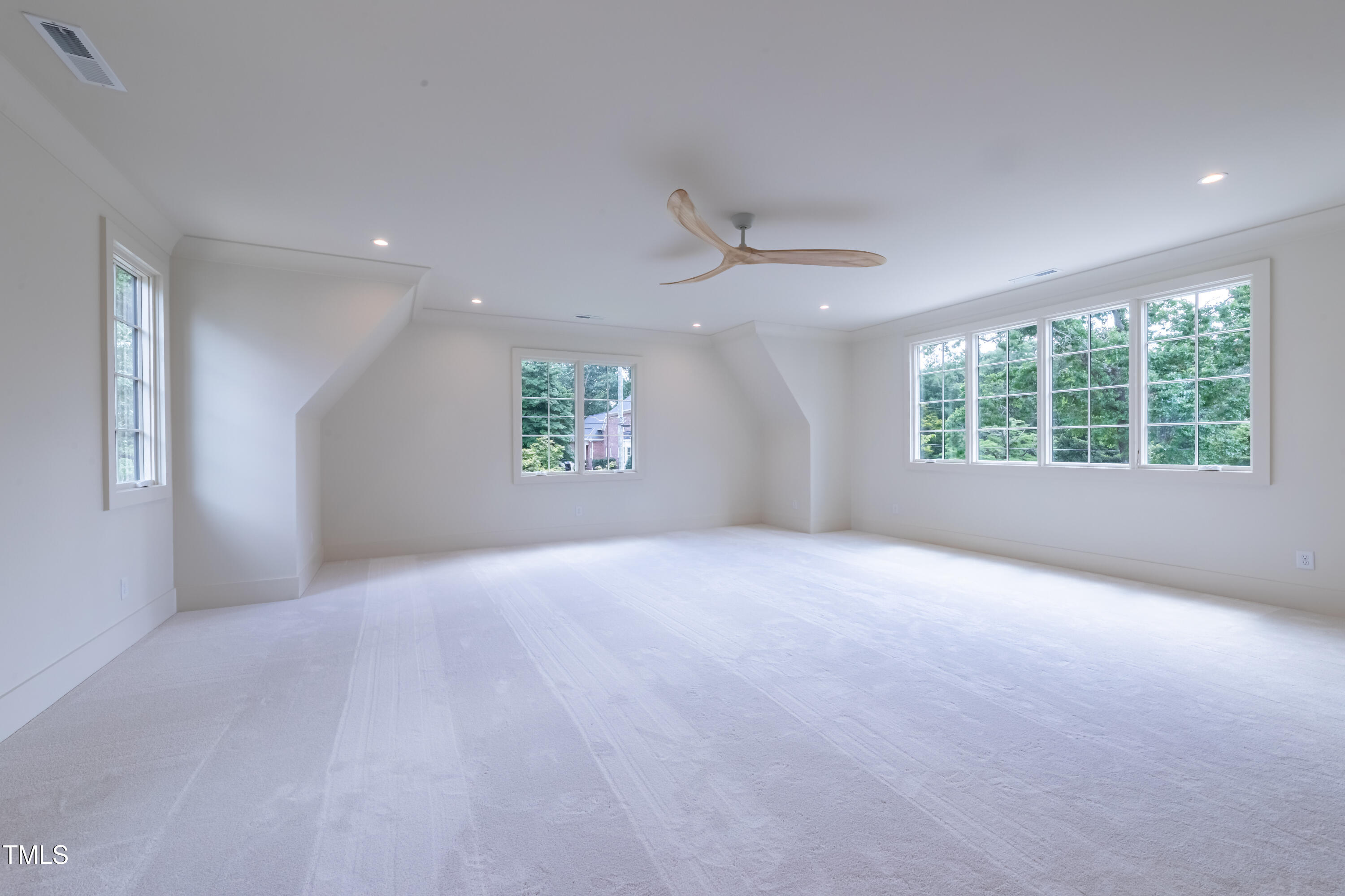 2227 Wheeler Road Raleigh, NC 27607 - Photo 48 of 56 an empty room with windows