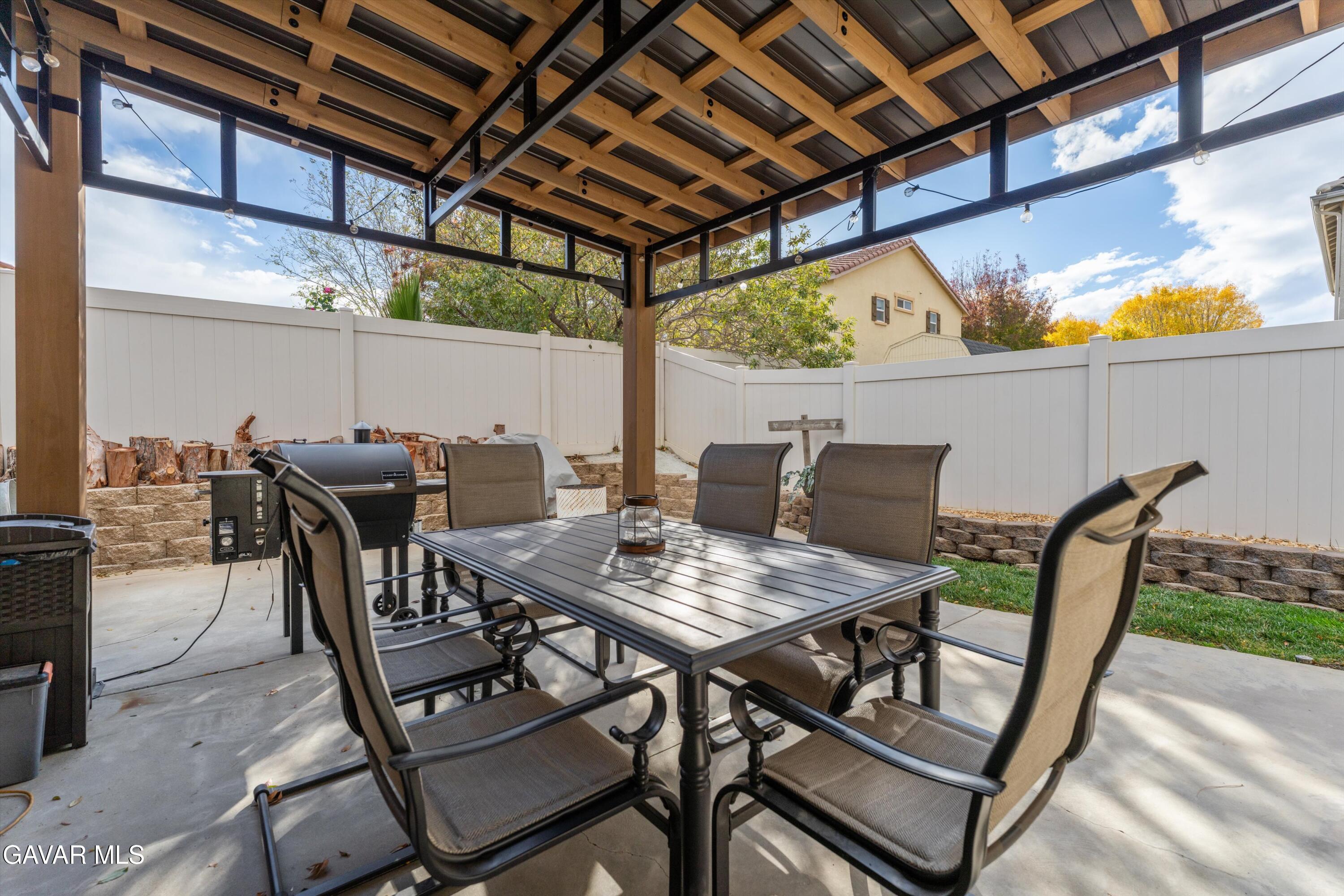 1413 Wild Olive Road Tehachapi, CA 93561 - Photo 6 of 29 a view of an outside dining area with furniture