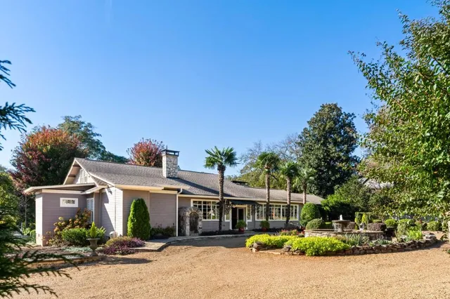 front view of a house with a small yard