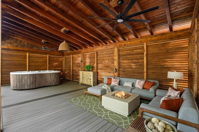 a front view of house with yard and outdoor seating