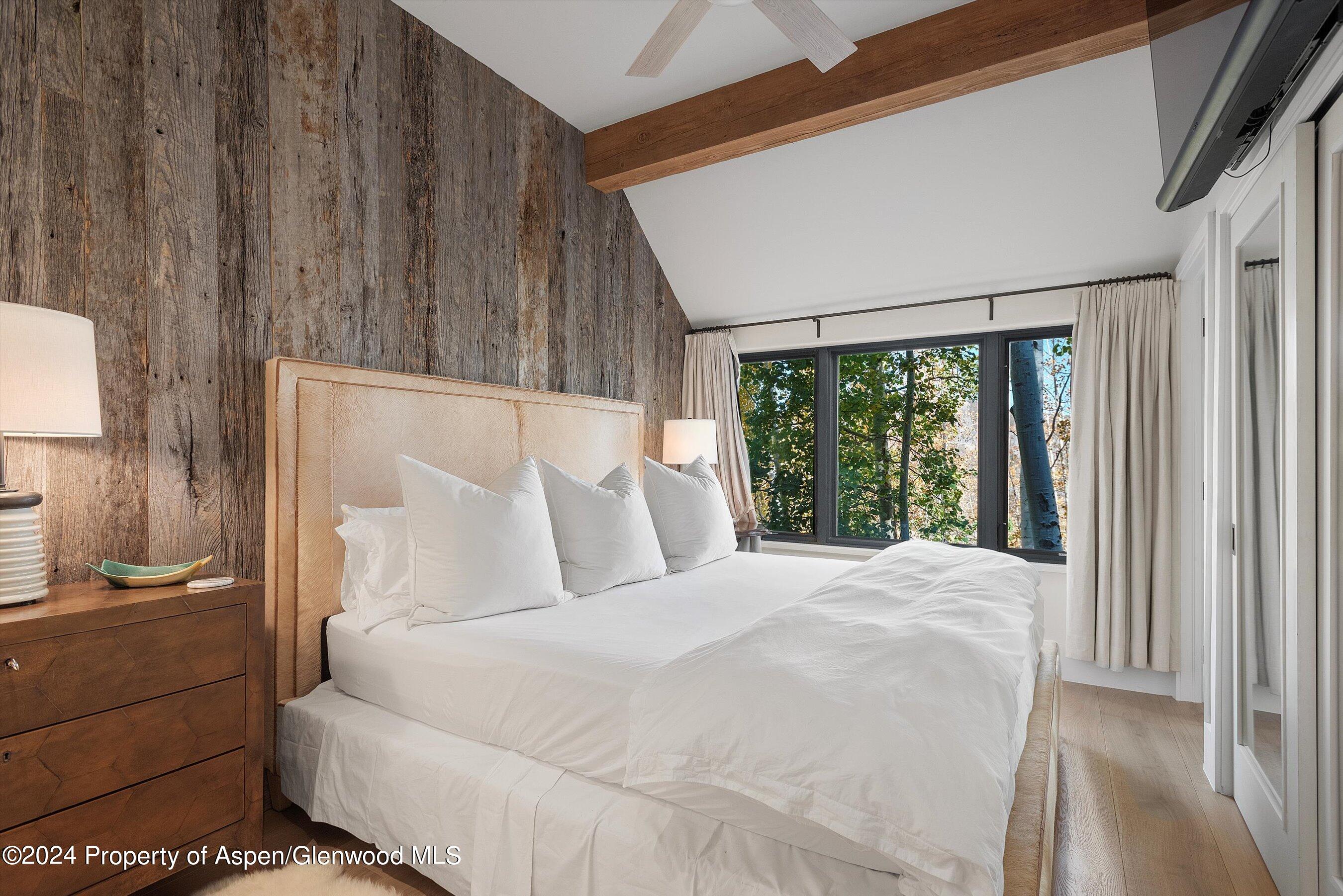 234 Bridge Lane Snowmass Village, CO 81615 - Photo 23 of 46 a large white bed in a white room