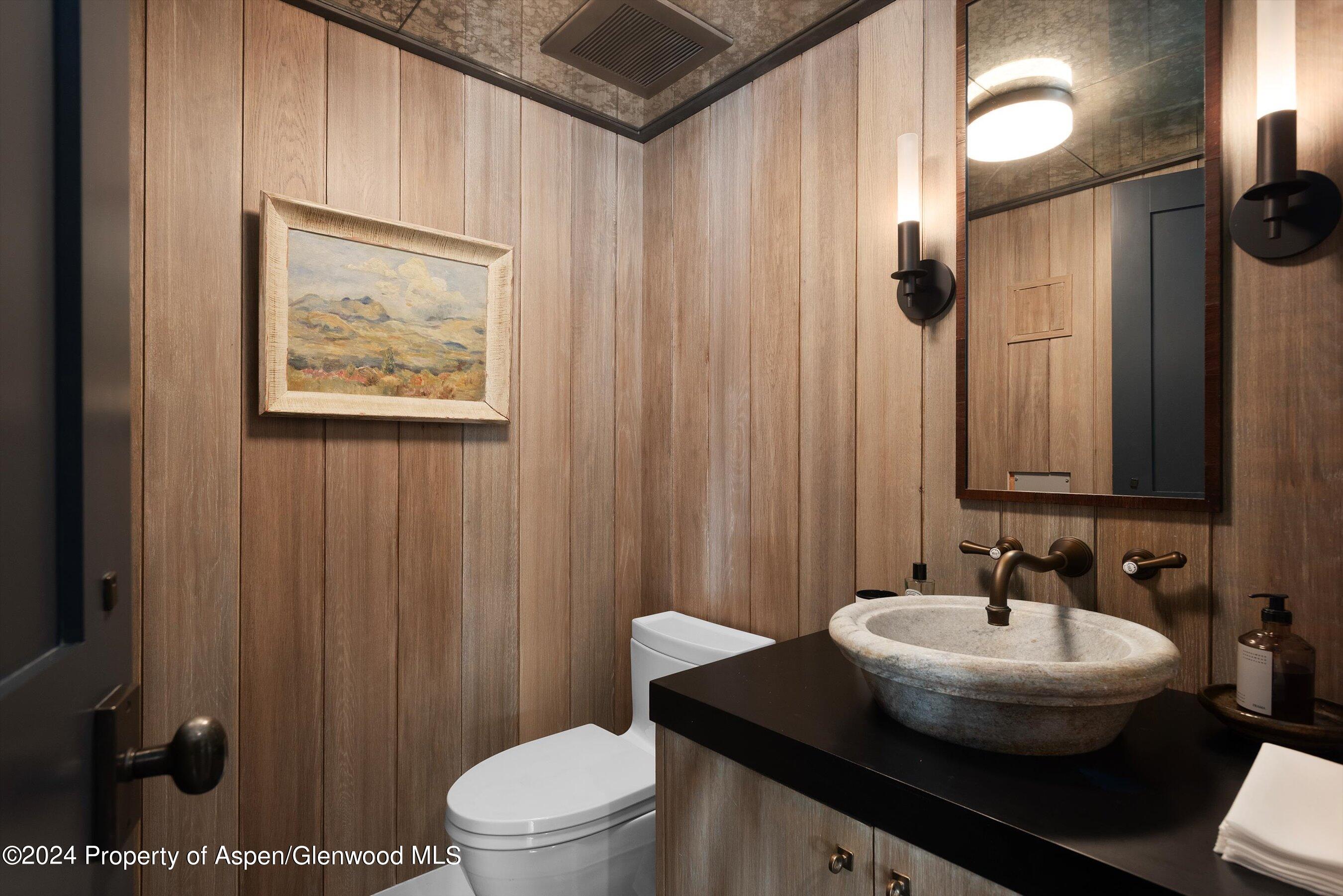 234 Bridge Lane Snowmass Village, CO 81615 - Photo 25 of 46 a bathroom with a sink and a mirror