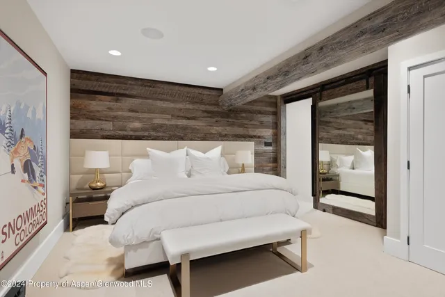 a bathroom with a double vanity sink and mirror