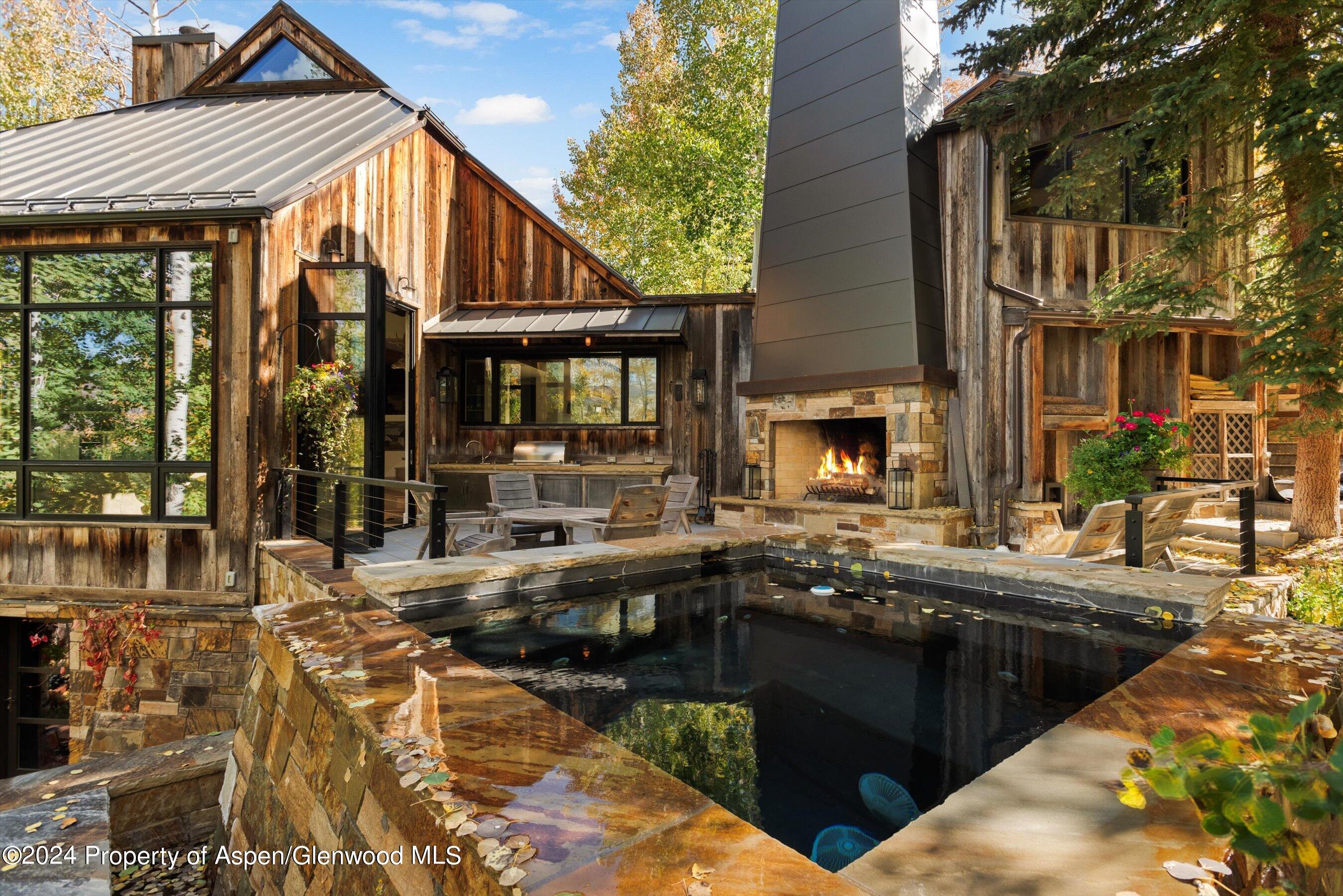 234 Bridge Lane Snowmass Village, CO 81615 - Photo 33 of 46 a view of a chairs and table in the balcony