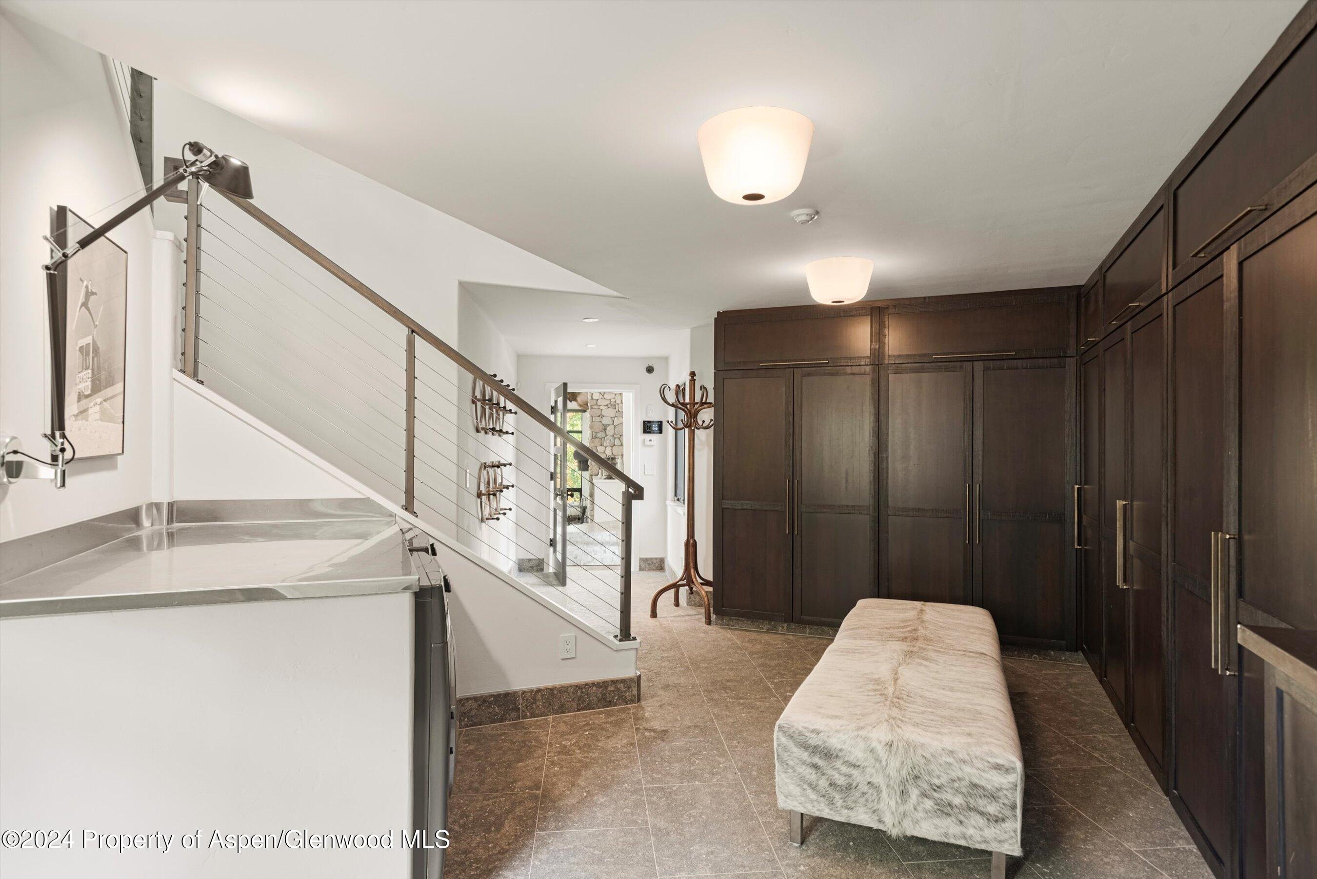 234 Bridge Lane Snowmass Village, CO 81615 - Photo 44 of 46 a view of entryway and hall with a chair