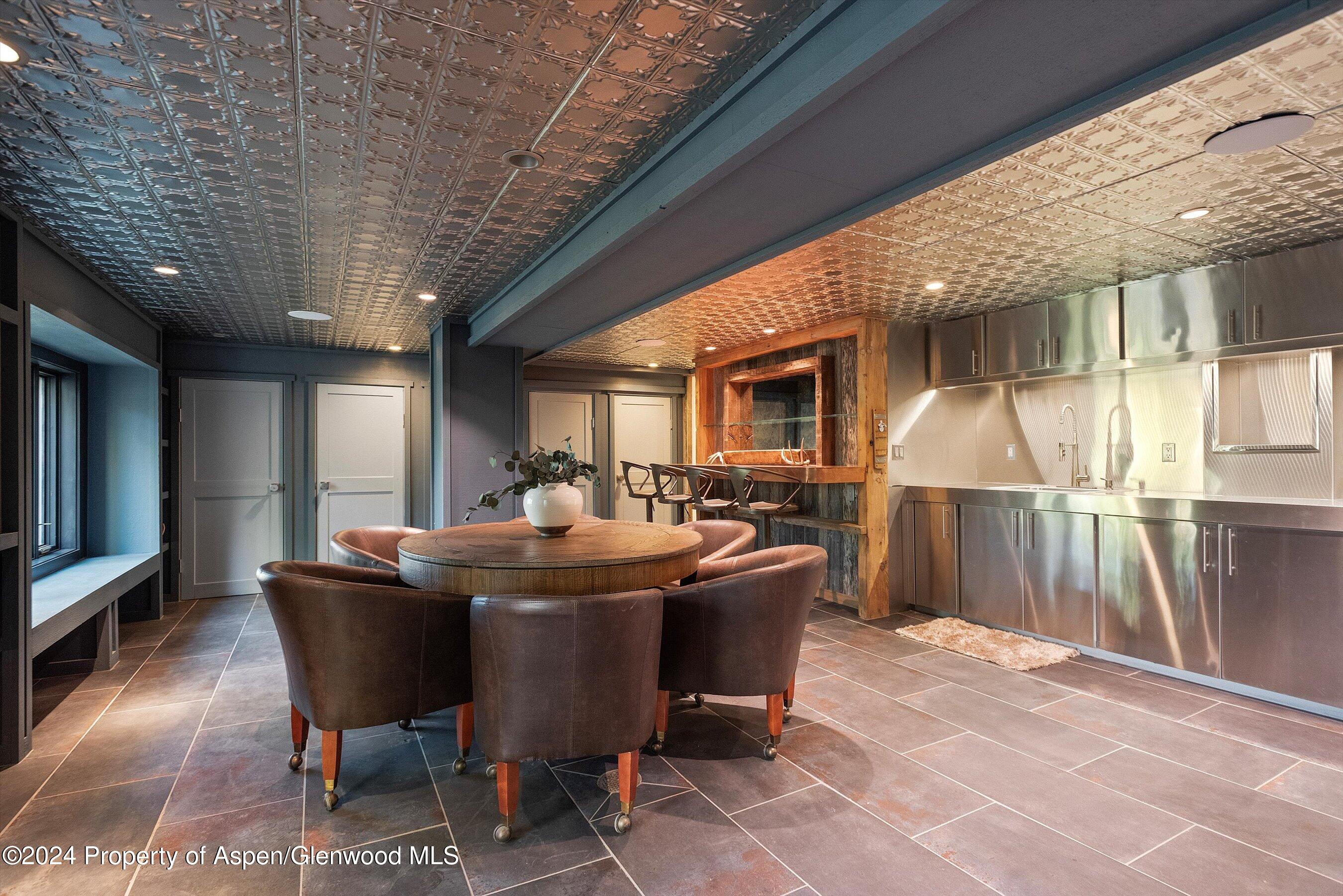 234 Bridge Lane Snowmass Village, CO 81615 - Photo 46 of 46 a dining room with a table and chairs