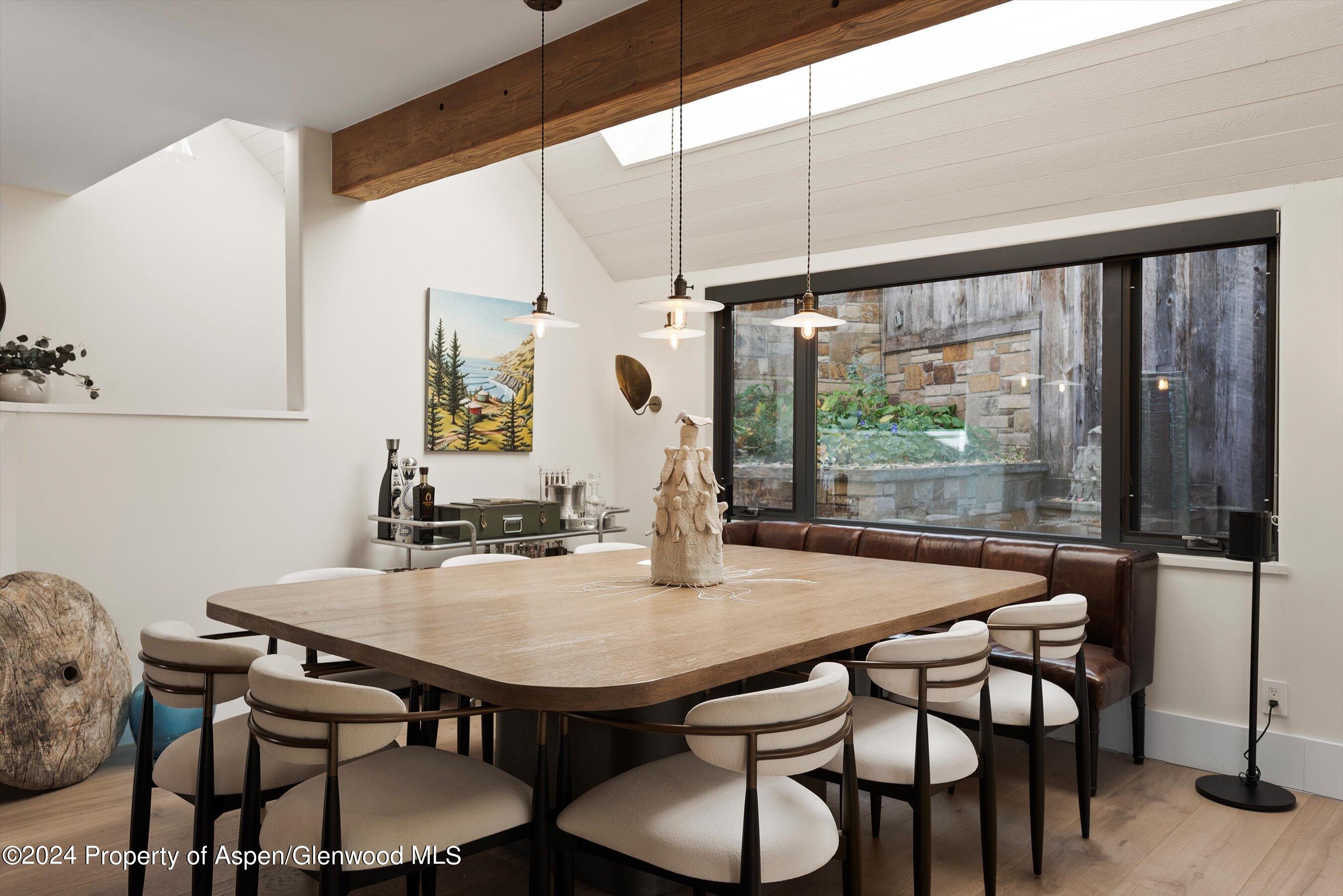 234 Bridge Lane Snowmass Village, CO 81615 - Photo 8 of 46 a view of a dining room with furniture window and outside view