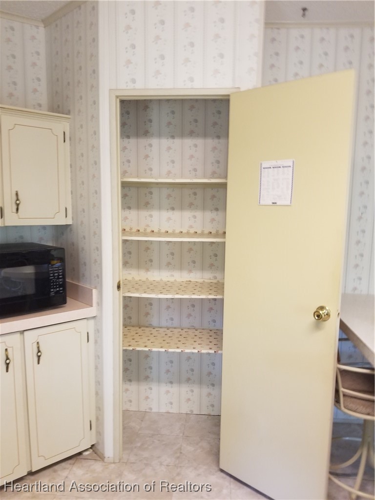 9125 Spur Path Sebring, FL 33875 - Photo 7 of 31 Kitchen pantry (when empty)