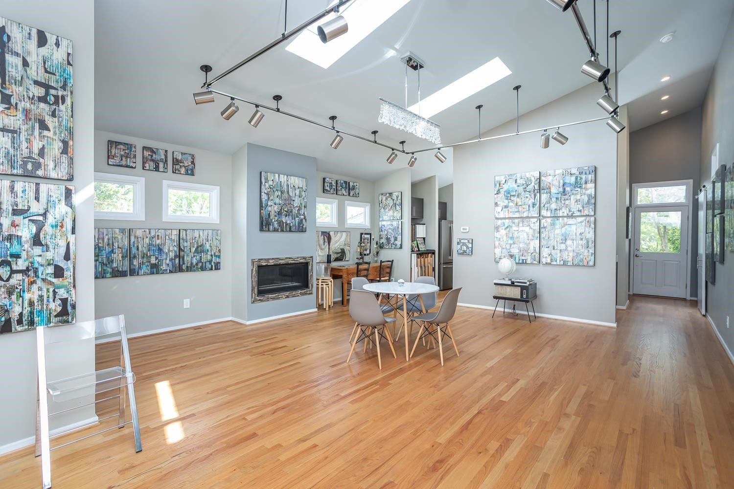601 Leonidas Court Raleigh, NC 27604 - Photo 22 of 53 Could also be a flex space - family room, large office, or could be converted into a separate living space. It has a front and rear accesses - perfect for coming and going without disrupting the main house. Art Studio