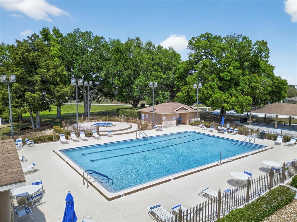 10447 Southwest 62nd Court Ocala, FL 34476 - Photo 53 of 58 swimming pool view with a seating space