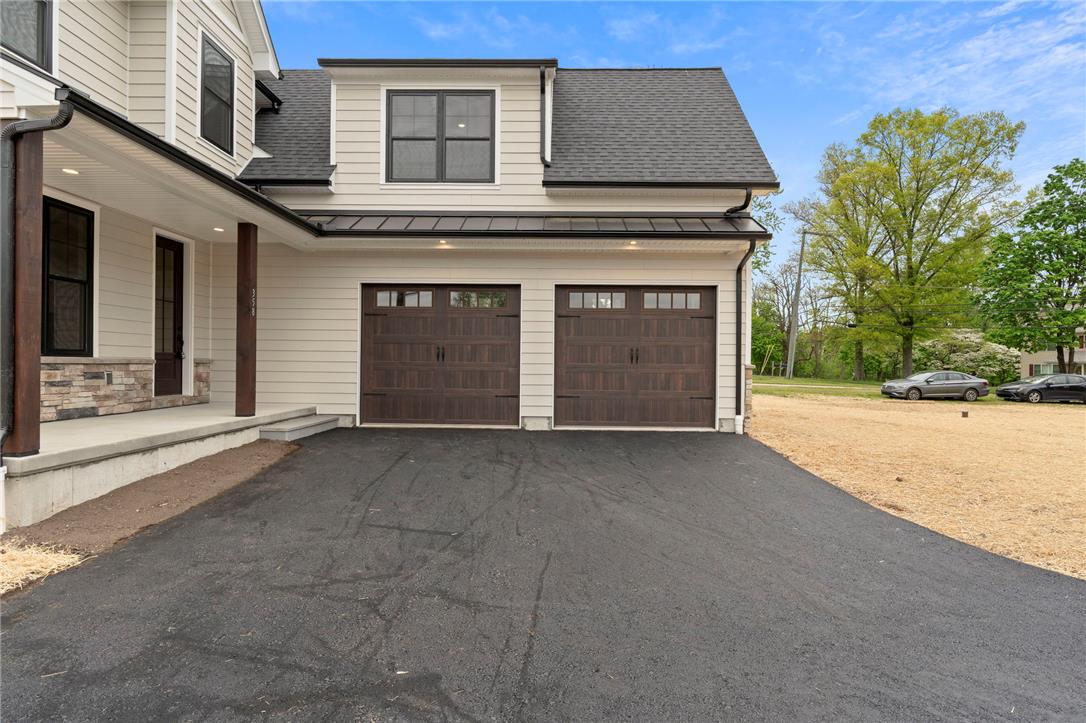 Hottle Road Quakertown, PA 18951 - Photo 2 of 59 Crisp horizontal siding and stone accents elevate the exterior of this two-car garage home.