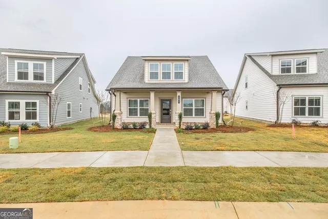 a view of a house with swimming pool