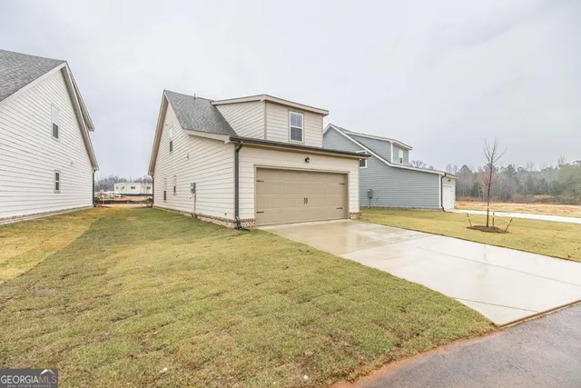a view of a house with swimming pool