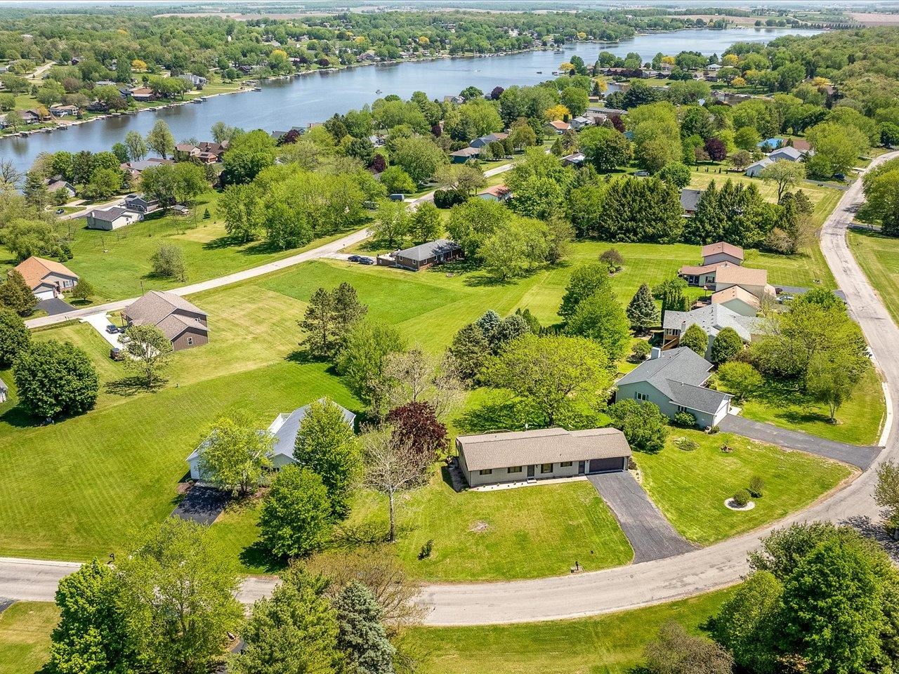 136 Lake Summerset Road Lake Summerset, IL 61019 - Photo 46 of 47 an aerial view of residential houses with outdoor space