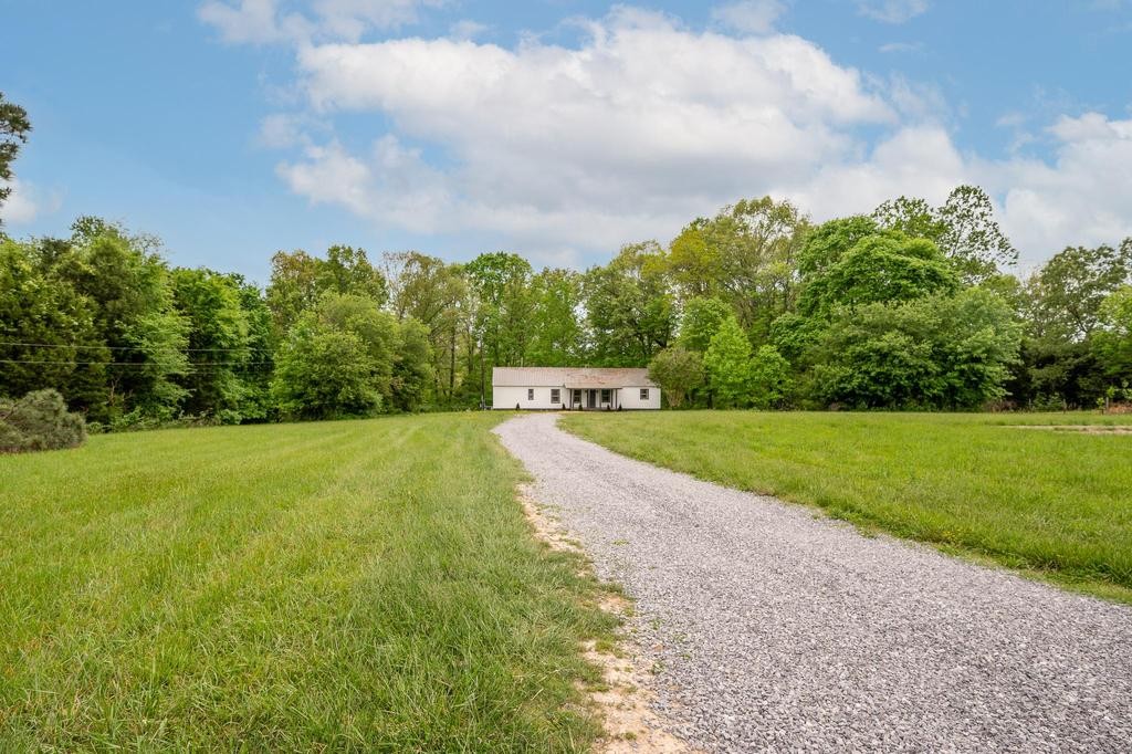 240 Meadows Road Portland, TN 37148 - Photo 4 of 29 a view of building with outdoor space