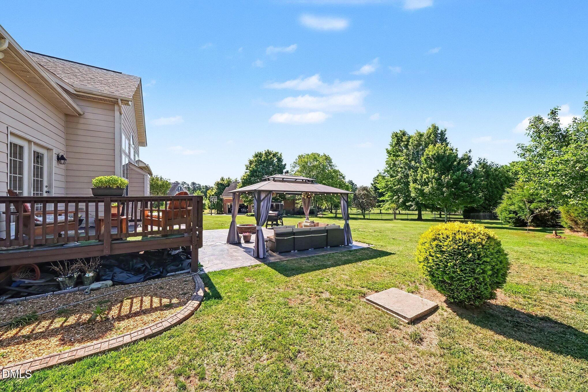 4000 Banks Stone Drive Raleigh, NC 27603 - Photo 43 of 60 a view of a swimming pool with a patio