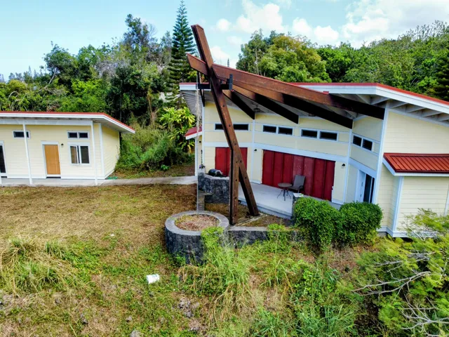 a backyard of a house with seating space