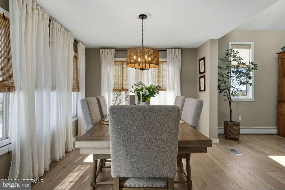 1210 Skimmer Court Forked River, NJ 08731 - Photo 19 of 66 a dining room with furniture and window