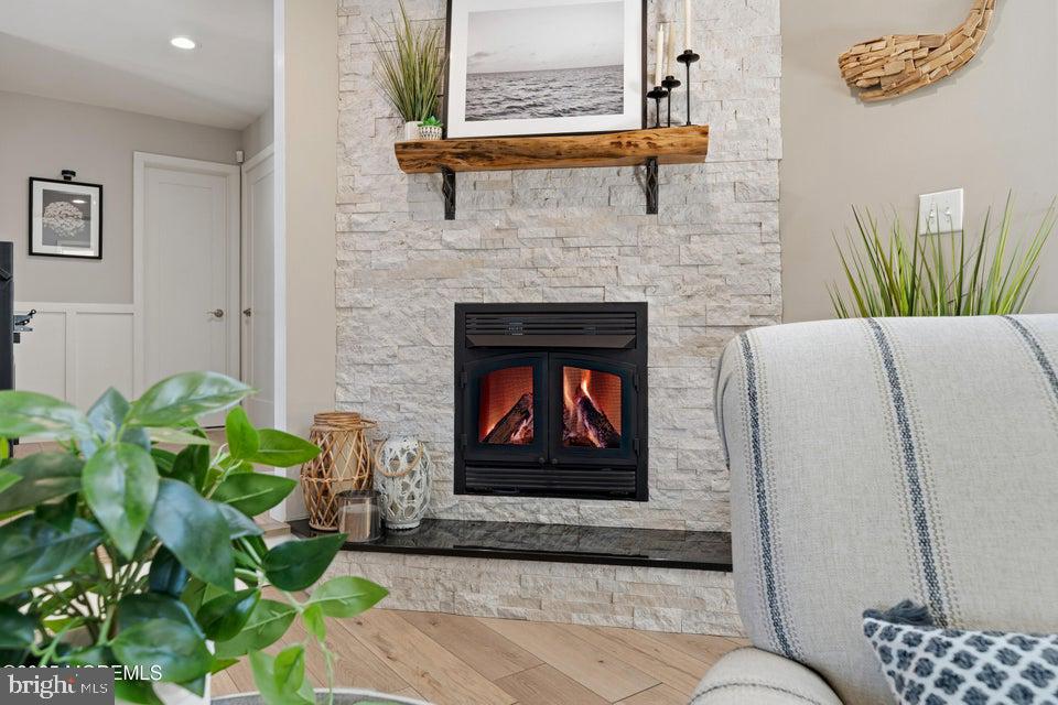 1210 Skimmer Court Forked River, NJ 08731 - Photo 22 of 66 a living room with furniture and a fireplace
