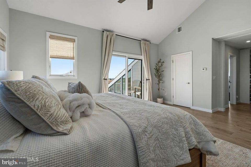 1210 Skimmer Court Forked River, NJ 08731 - Photo 34 of 66 a bedroom with a bed and a large mirror