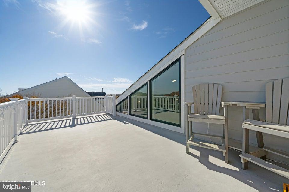 1210 Skimmer Court Forked River, NJ 08731 - Photo 38 of 66 a view of a porch with wooden floor