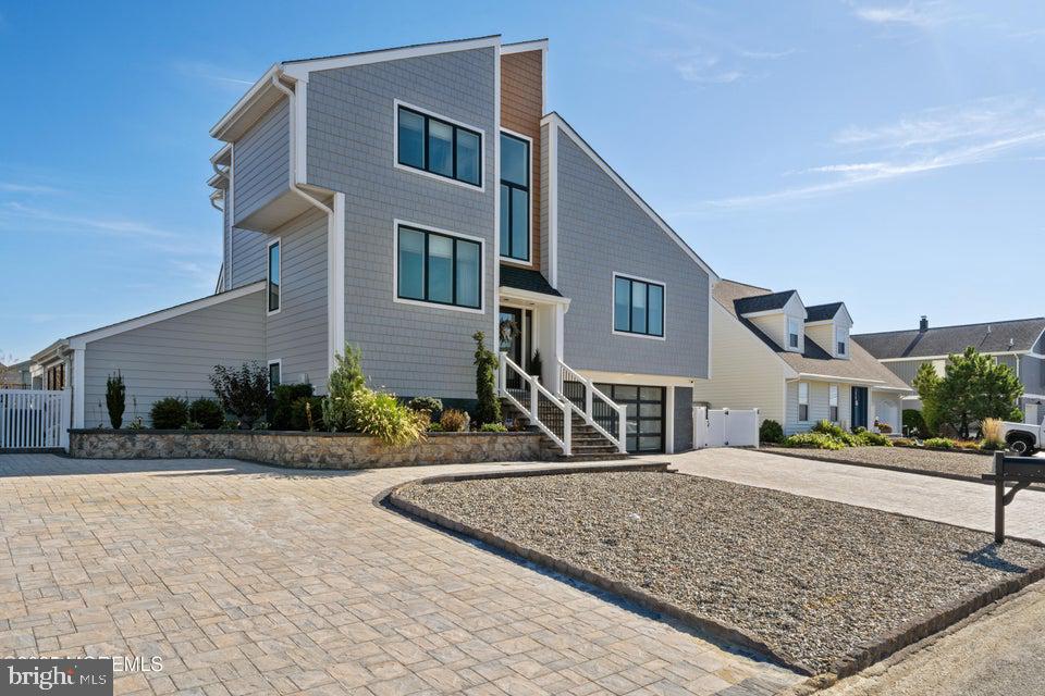 1210 Skimmer Court Forked River, NJ 08731 - Photo 8 of 66 a front view of a house with a yard