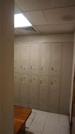 a view of a house with backyard sitting area and garden