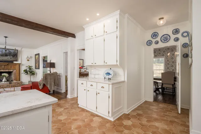 a kitchen with stainless steel appliances granite countertop a sink and a stove