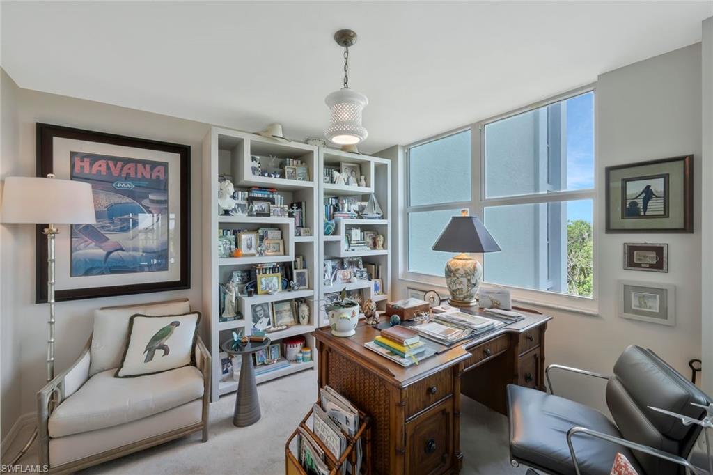 6573 Marissa Loop, Unit 303 Naples, FL 34108 - Photo 16 of 31 a view of a livingroom with furniture and window