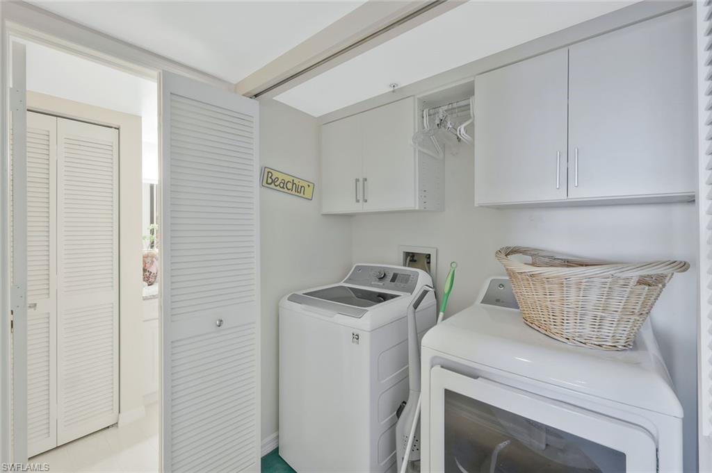 6573 Marissa Loop, Unit 303 Naples, FL 34108 - Photo 18 of 31 a view of kitchen and sink