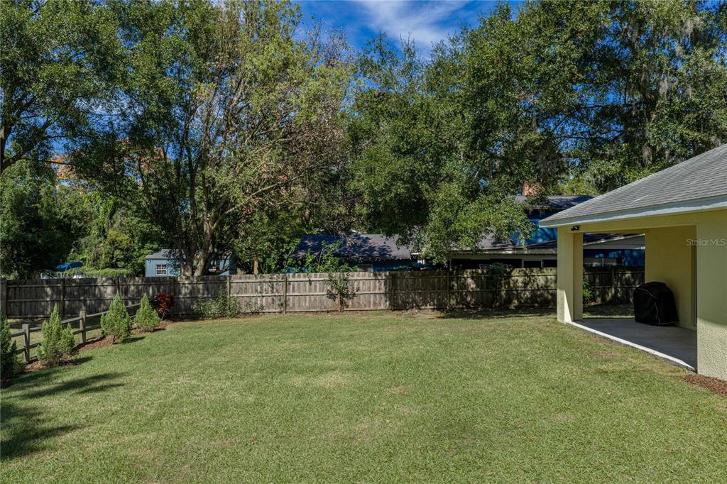 13907 9th Street Dade City, FL 33525 - Photo 41 of 43 a view of a house with a park