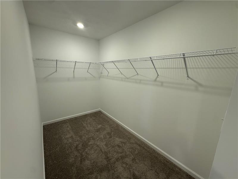 4005 Chakeres Avenue Springfield, OH 45505 - Photo 13 of 19 This spacious closet offers ample storage and organization solutions.