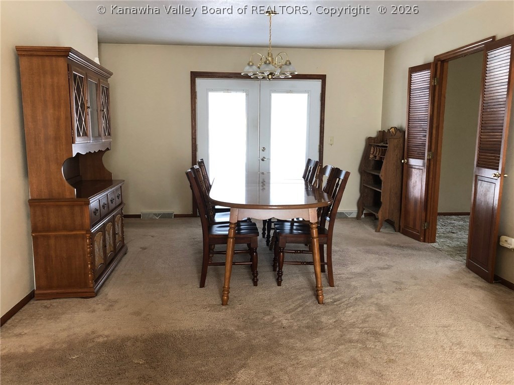 FORMAL DINING AREA OFF LIVING ROOM & FAMILYROOM TO RIGHT