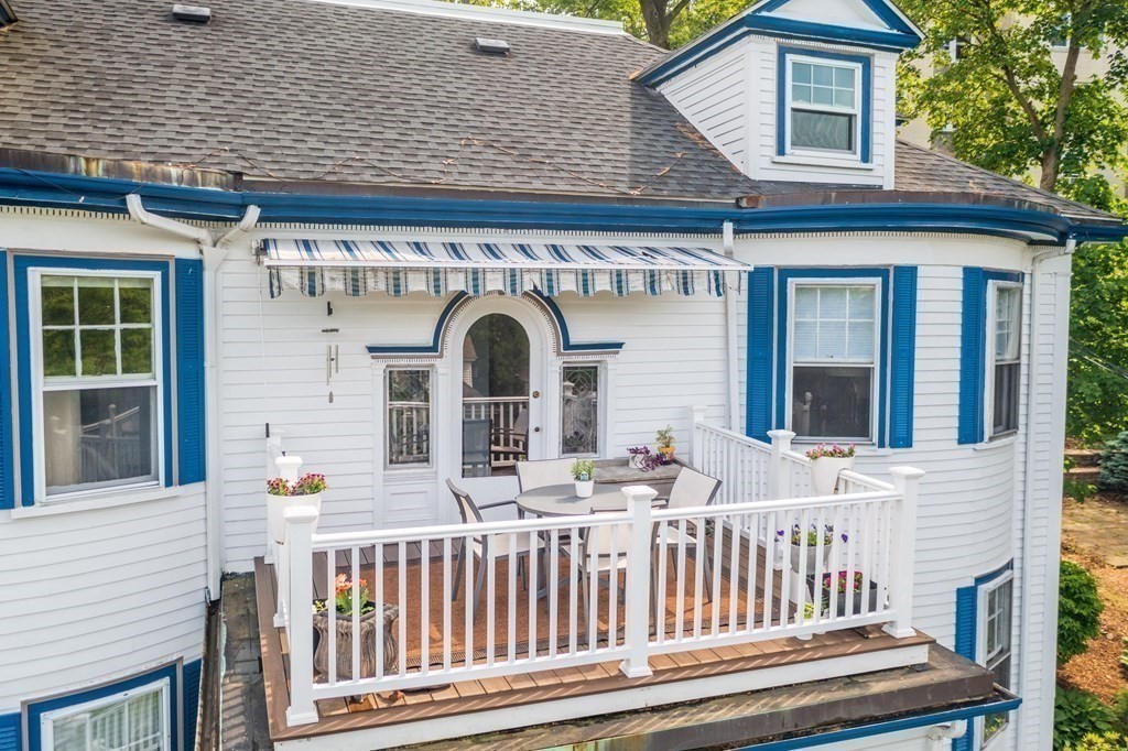 79 University Road, Unit 2 Brookline, MA 02445 - Photo 2 of 35 a view of a house with a porch