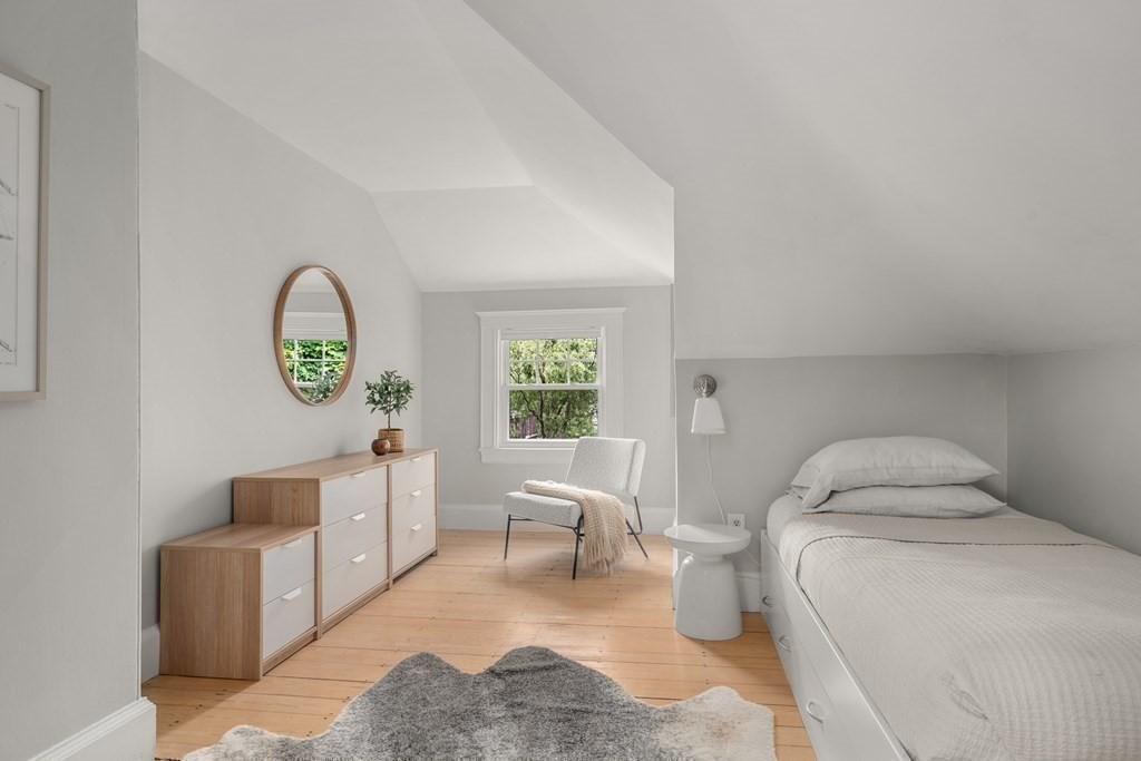 79 University Road, Unit 2 Brookline, MA 02445 - Photo 21 of 35 a living room with furniture and a window