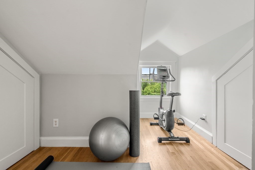 79 University Road, Unit 2 Brookline, MA 02445 - Photo 27 of 35 a view of a room with gym equipment