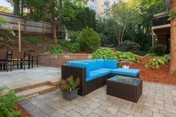 79 University Road, Unit 2 Brookline, MA 02445 - Photo 29 of 35 a view of a backyard with sitting area