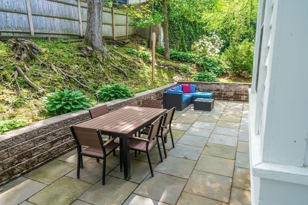 79 University Road, Unit 2 Brookline, MA 02445 - Photo 32 of 35 a balcony view with a seating space