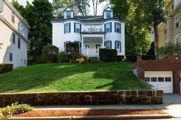 79 University Road, Unit 2 Brookline, MA 02445 - Photo 33 of 35 a front view of a house with a garden