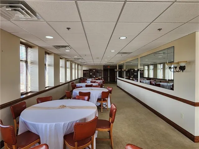 a kitchen filled with lots of windows