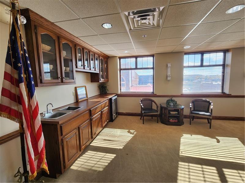 19 East Washington Street New Castle, PA 16101 - Photo 12 of 16 a kitchen filled with lots of windows