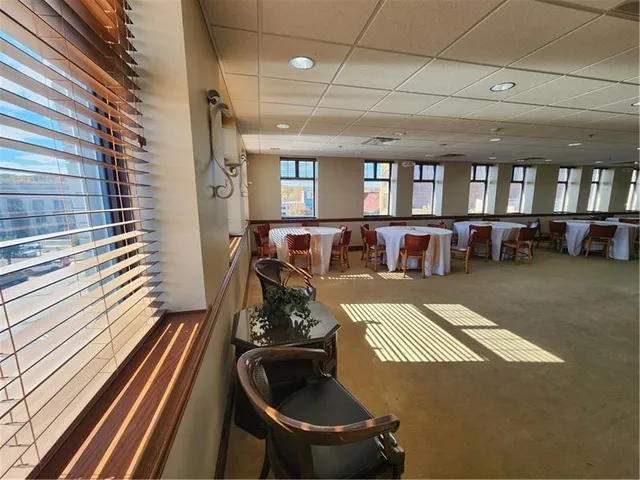 a room with furniture and window