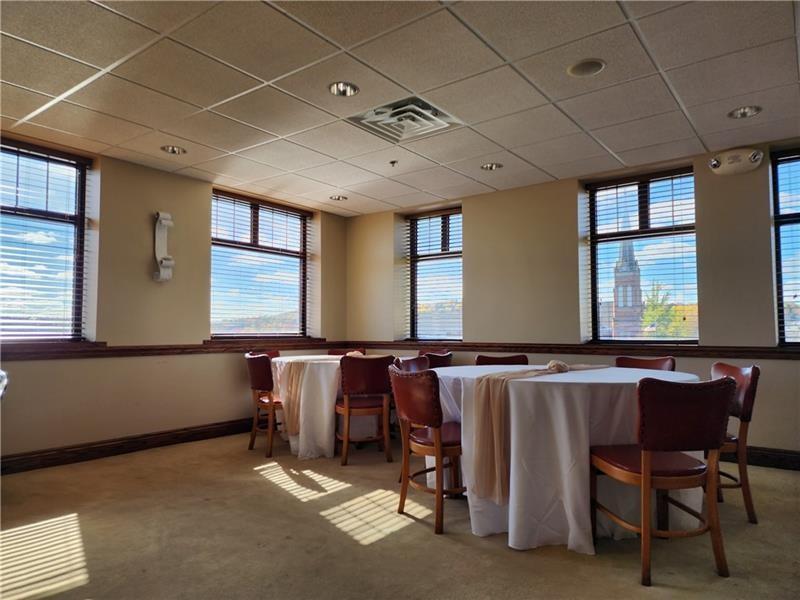 19 East Washington Street New Castle, PA 16101 - Photo 14 of 16 a room with furniture and window