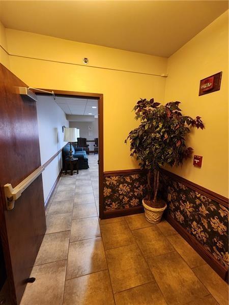 19 East Washington Street New Castle, PA 16101 - Photo 6 of 16 a view of entryway with wooden floor