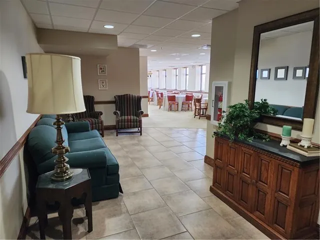 a lobby with furniture and a couch